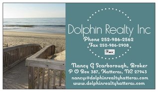 Business card for Dolphin Realty Inc with beach photo, contact info, and broker’s name and email on a blue background.